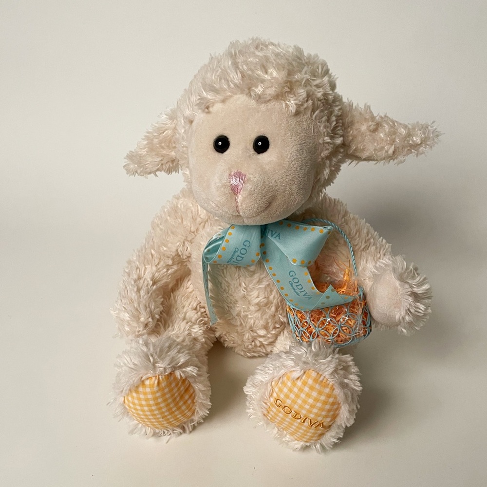 Soft Godiva Chocolate plush lamb holding wire basket, retired.